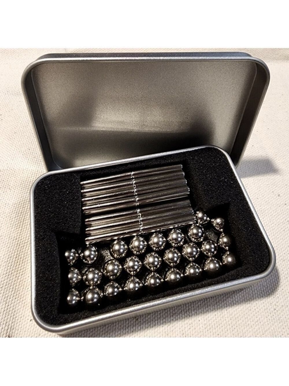 Magnetic rods with balls